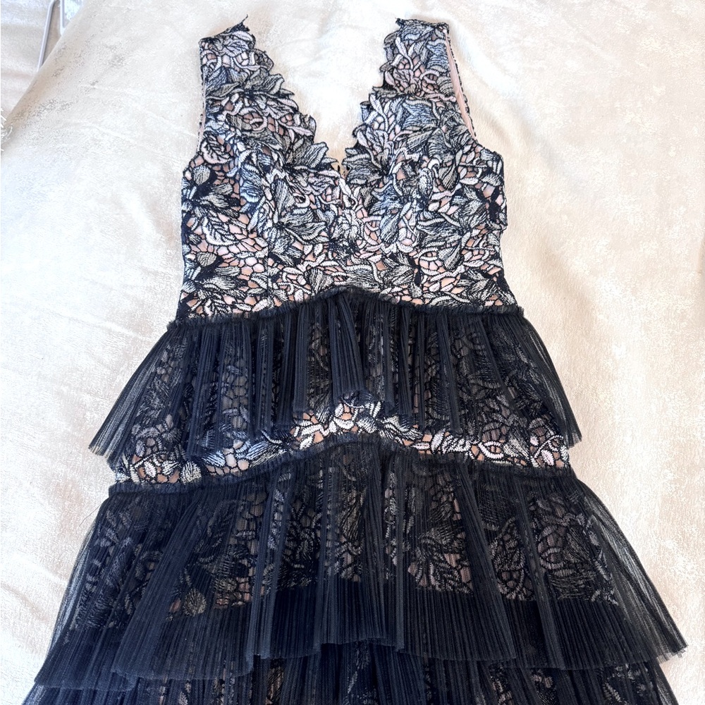 Tulu dress fits a size 2